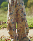 FLOWER PRINTED DENIM WAIST DROPPED POCKETS PANT