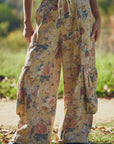 FLOWER PRINTED DENIM WAIST DROPPED POCKETS PANT