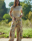 FLOWER PRINTED DENIM WAIST DROPPED POCKETS PANT