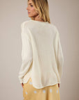 ROUND ROLL UP NECK LEMON GRAPHIC SWEATER