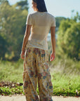 FLOWER PRINTED DENIM WAIST DROPPED POCKETS PANT