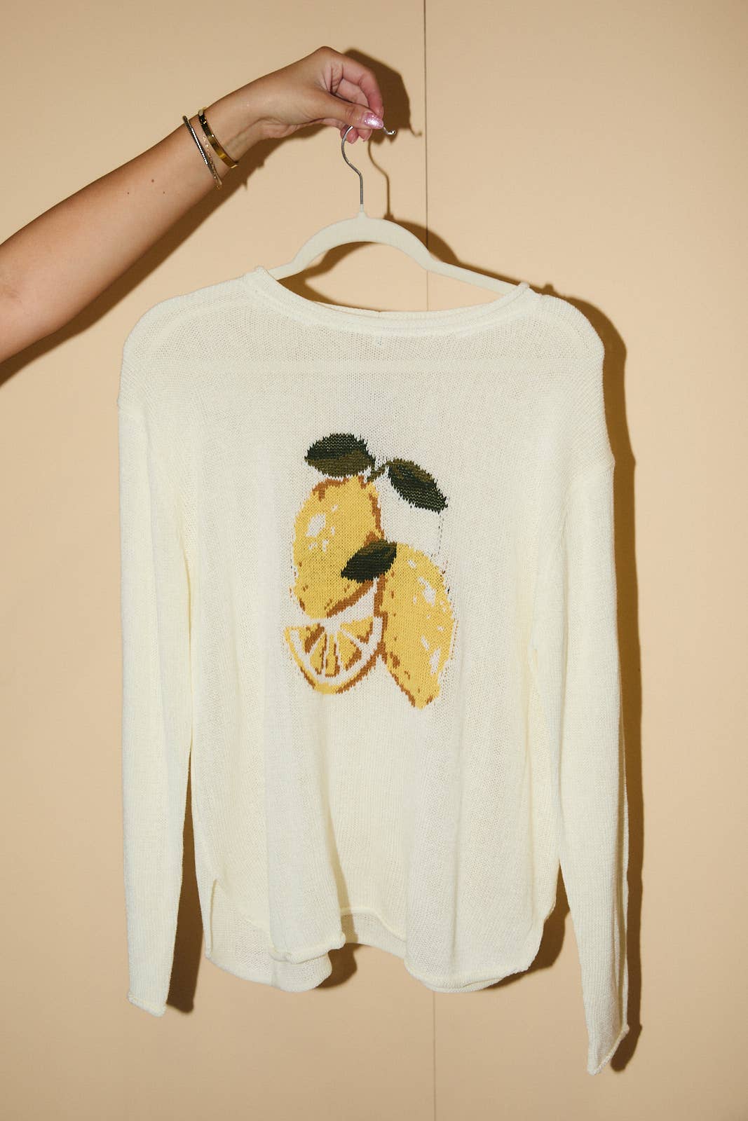 ROUND ROLL UP NECK LEMON GRAPHIC SWEATER